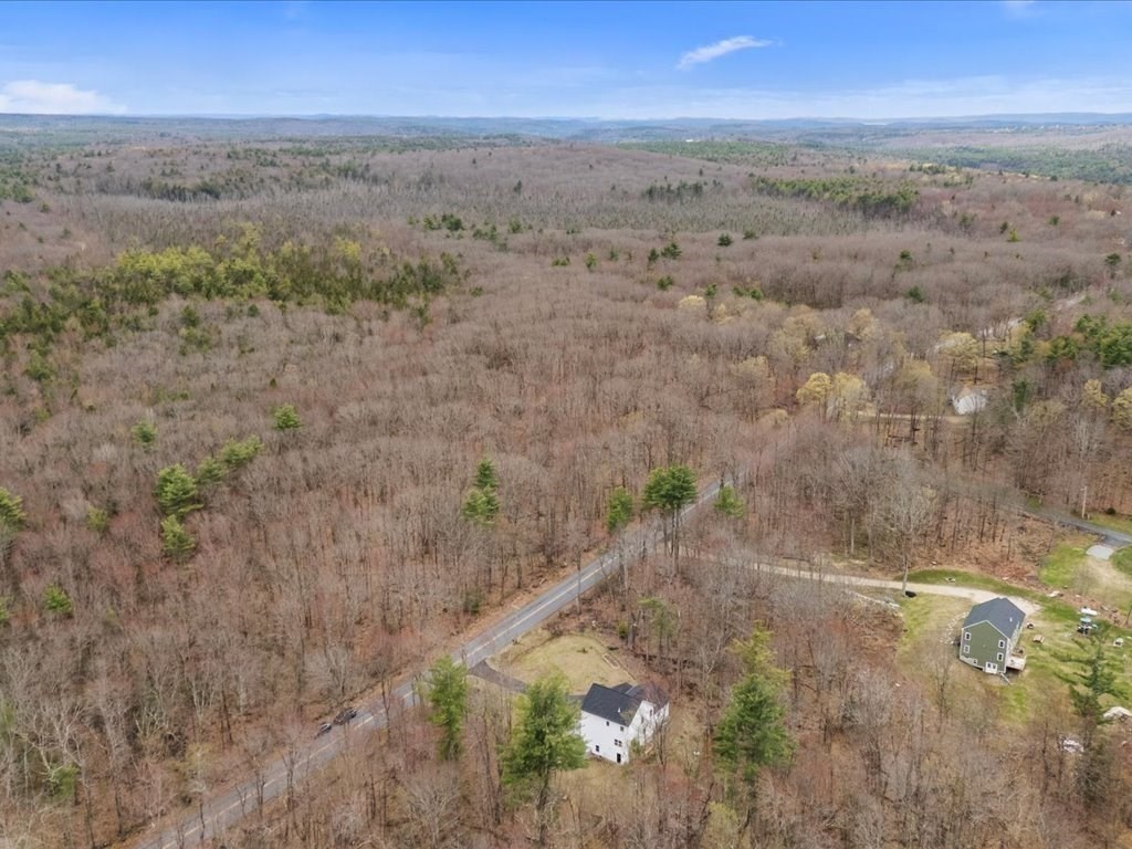 560 Queen Lake Road Phillipston, MA 01331 - Photo 37 of 42 a view of a dry yard with green space