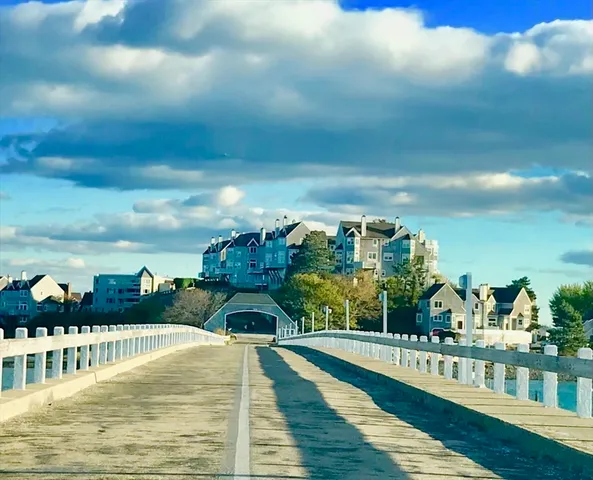 a view of a terrace with a table and chairs