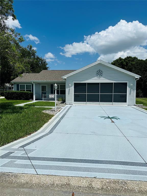917 Camino Del Rey Drive Lady Lake, FL 32159 - Photo 1 of 46 a house view with a garden space