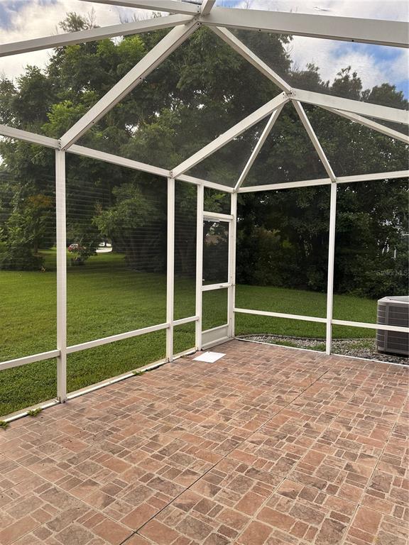 917 Camino Del Rey Drive Lady Lake, FL 32159 - Photo 21 of 46 a view of a backyard