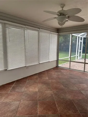 a white toilet sitting next to a bath tub