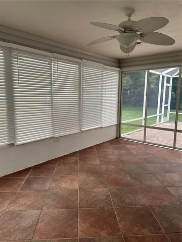 a white toilet sitting next to a bath tub