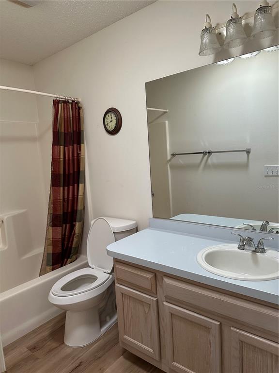 917 Camino Del Rey Drive Lady Lake, FL 32159 - Photo 29 of 46 a bathroom with a sink a toilet and shower