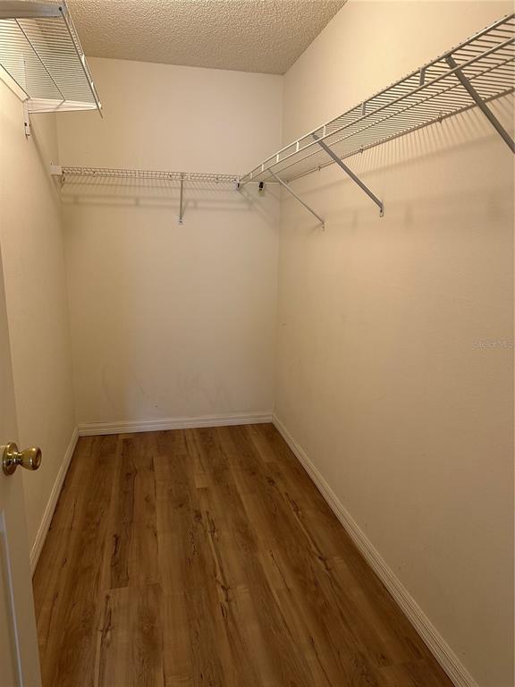 917 Camino Del Rey Drive Lady Lake, FL 32159 - Photo 34 of 46 a view of a room with racks on the wall