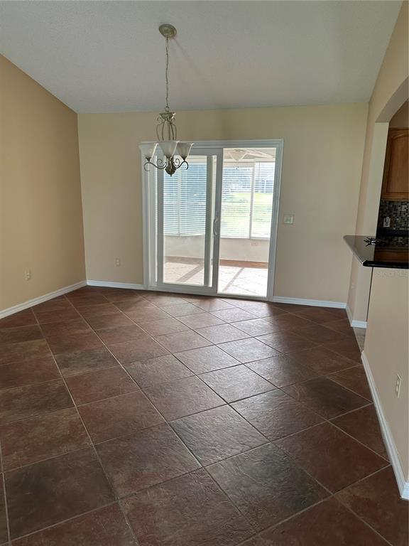 917 Camino Del Rey Drive Lady Lake, FL 32159 - Photo 9 of 46 a view of an empty room with a window