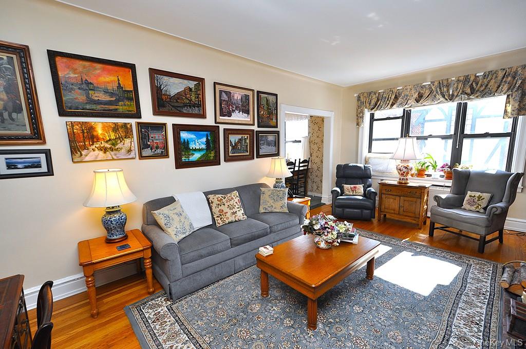 143 Garth Road, Unit 4D Scarsdale, NY 10583 - Photo 1 of 45 The large living room and dining area has sunny southern exposures, has hardwood floors and is approx 20'-1" x 12'-6".