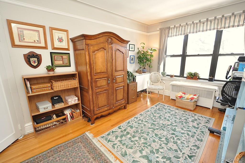 143 Garth Road, Unit 4D Scarsdale, NY 10583 - Photo 26 of 45 The large second bedroom has hardwood floors and overlooks tree lined Garth Road. The bedroom is approx 17'-1" x 10'-3".