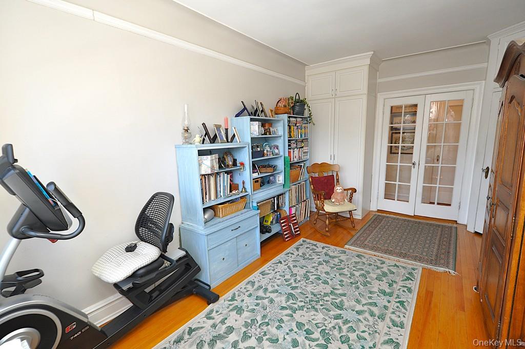 143 Garth Road, Unit 4D Scarsdale, NY 10583 - Photo 29 of 45 The large second bedroom has hardwood floors and overlooks tree lined Garth Road. The bedroom is approx 17'-1" x 10'-3".