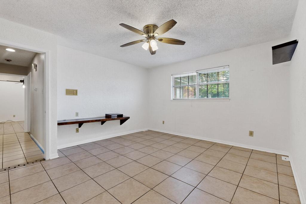 5180 Farm To Market Road 972 Granger, TX 76530 - Photo 17 of 39 a view of an empty room and window