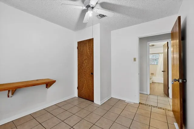 a view of a hallway with closet