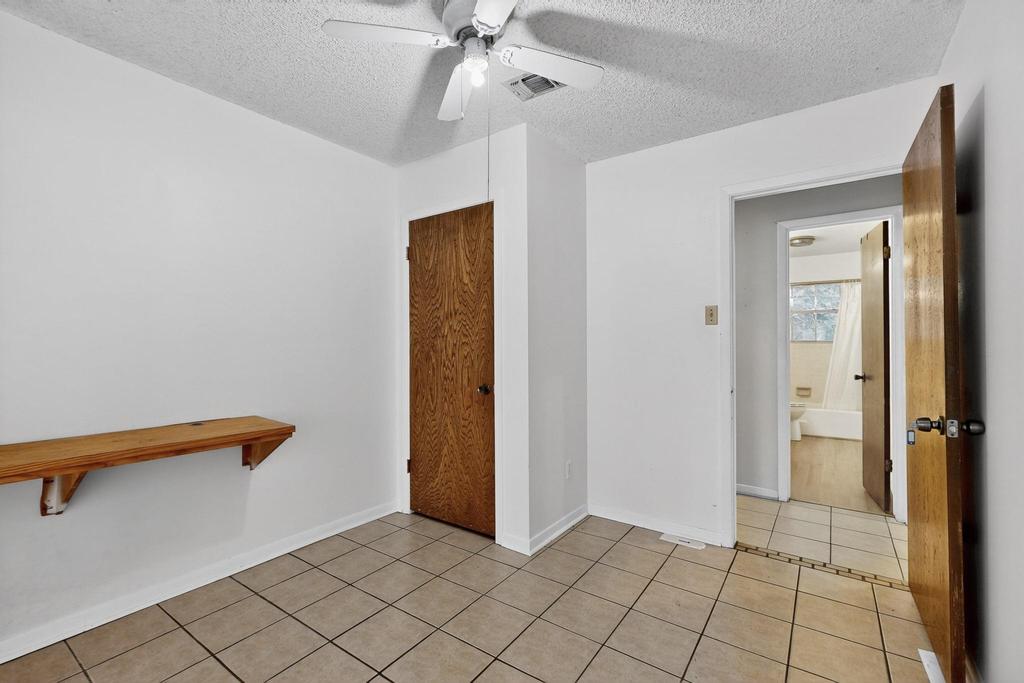 5180 Farm To Market Road 972 Granger, TX 76530 - Photo 21 of 39 a view of a hallway with closet