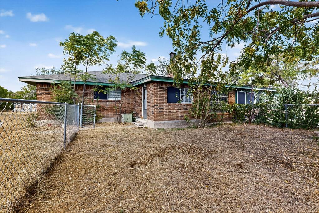 5180 Farm To Market Road 972 Granger, TX 76530 - Photo 35 of 39 a front view of a house with a yard