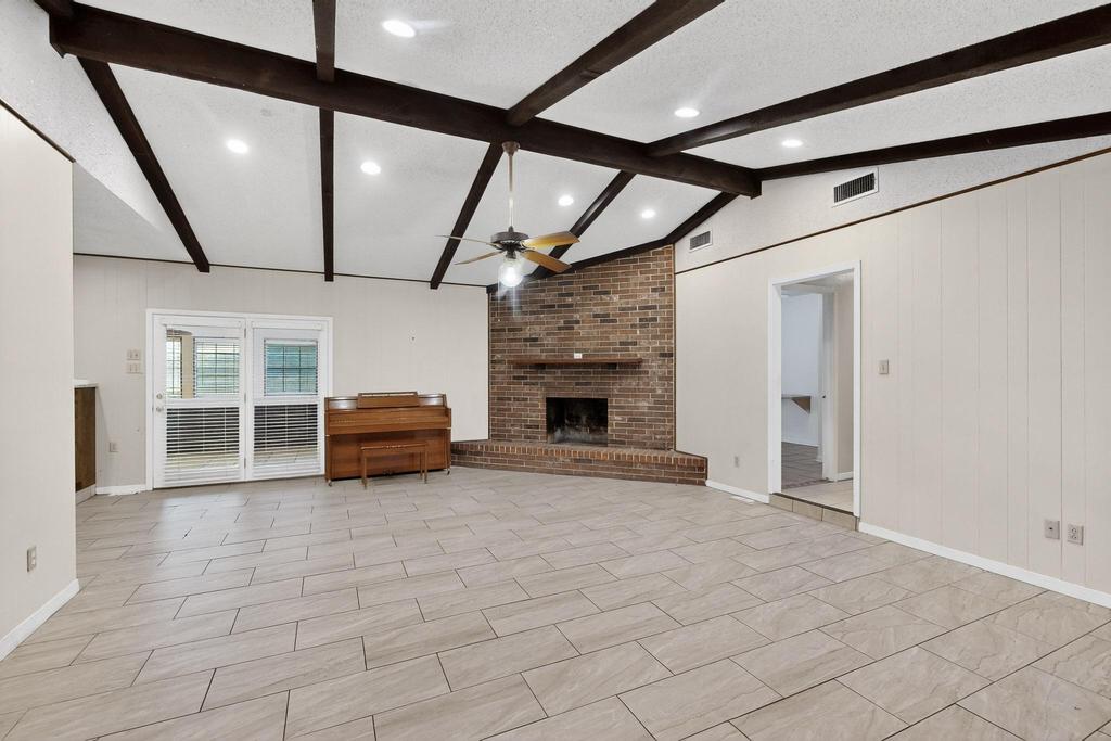 5180 Farm To Market Road 972 Granger, TX 76530 - Photo 6 of 39 a view of living room with furniture and a fireplace