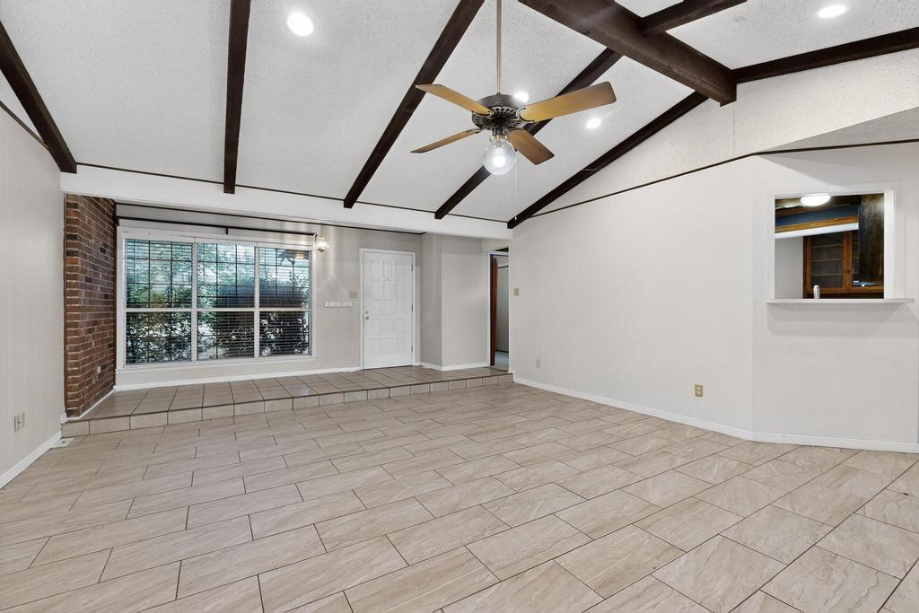 5180 Farm To Market Road 972 Granger, TX 76530 - Photo 8 of 39 a view of an empty room with a window