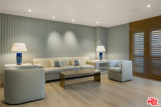 1347 Palisades Beach Road Santa Monica, CA 90401 - Photo 11 of 64 a living room with furniture and a lamp