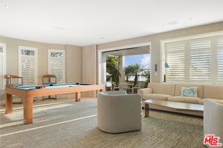 1347 Palisades Beach Road Santa Monica, CA 90401 - Photo 15 of 64 a living room with furniture and a large window