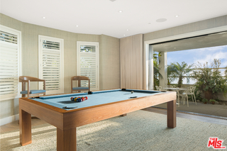 1347 Palisades Beach Road Santa Monica, CA 90401 - Photo 16 of 64 a room with pool table and windows