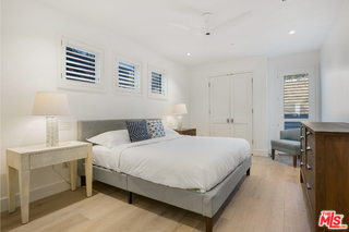 1347 Palisades Beach Road Santa Monica, CA 90401 - Photo 35 of 64 a bedroom with a bed and a night stand
