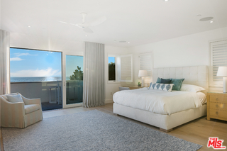 1347 Palisades Beach Road Santa Monica, CA 90401 - Photo 46 of 64 a bedroom with a bed and a couch