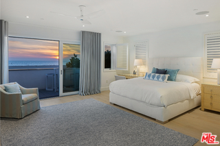 1347 Palisades Beach Road Santa Monica, CA 90401 - Photo 53 of 64 a spacious bedroom with a bed and a couch