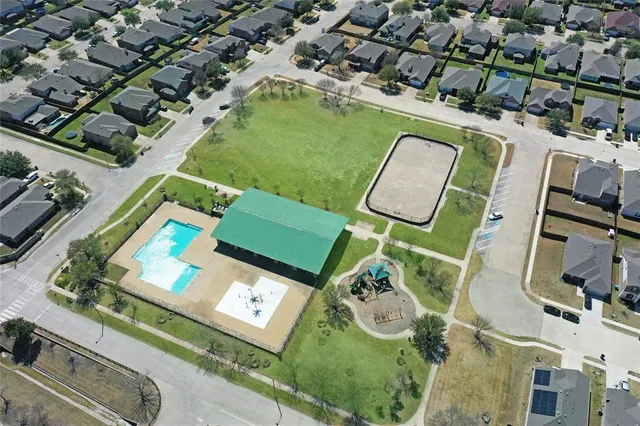 an aerial view of a pool