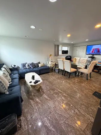 a living room with furniture and a couch