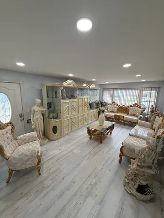a living room with furniture and a couch