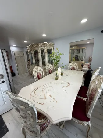a view of a dining room with furniture