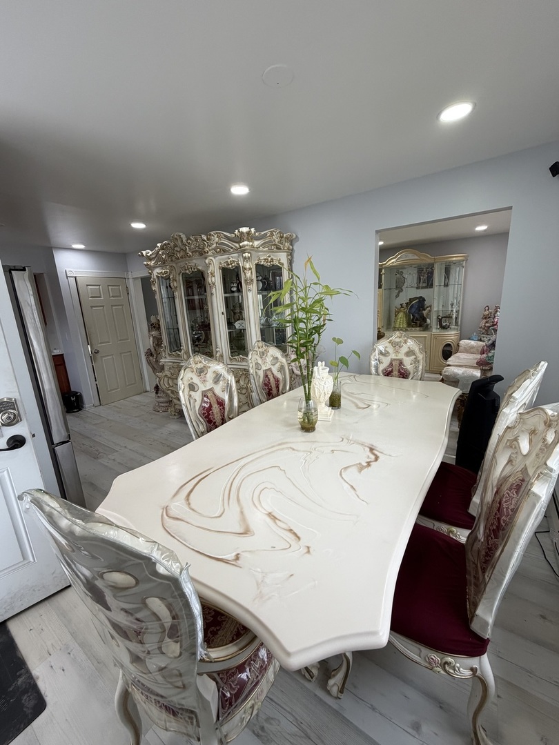 1643 Sycamore Street Des Plaines, IL 60018 - Photo 7 of 27 a view of a dining room with furniture
