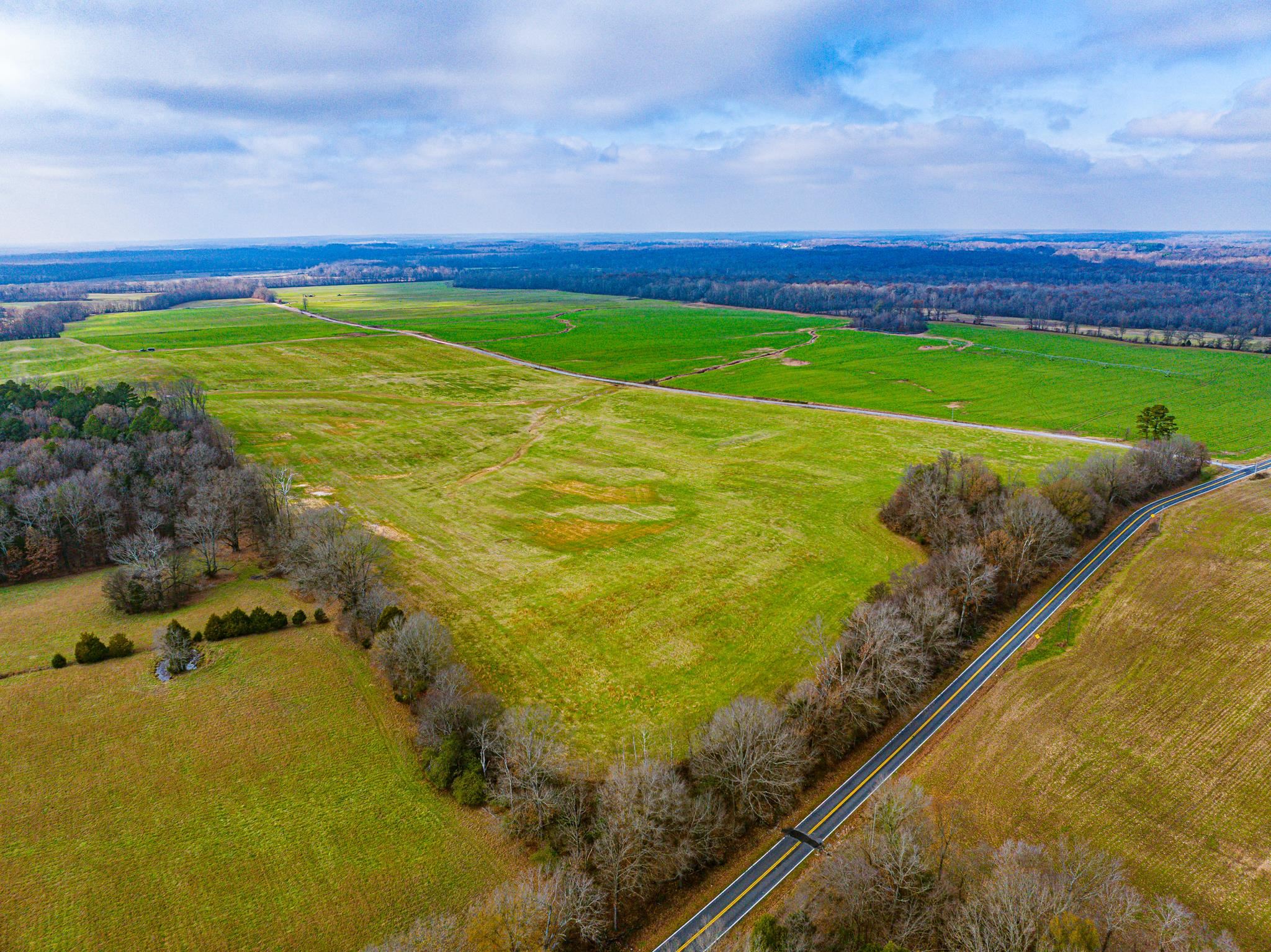0 Como & Mckenzie Road McKenzie, TN 38201 - Photo 2 of 16 Aerial view of sparsely populated area featuring extensive farmland