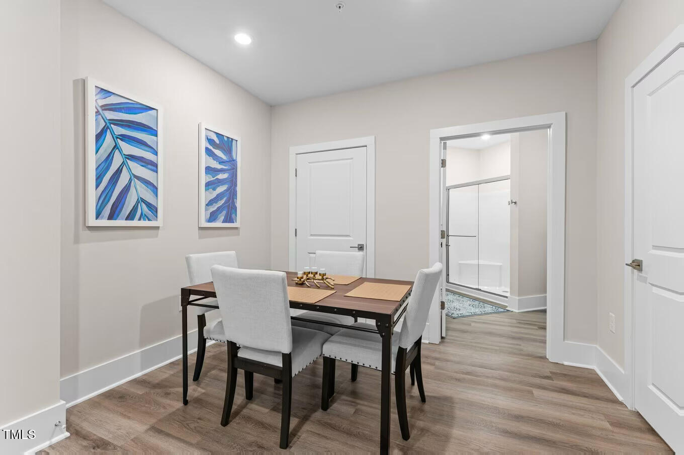1001 Mulford Court, Unit B1 Knightdale, NC 27545 - Photo 12 of 41 a view of a room with furniture and wooden floor