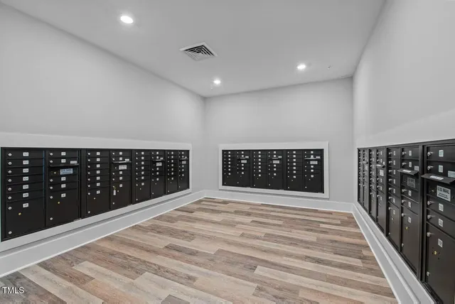 a view of wooden floor with staircase