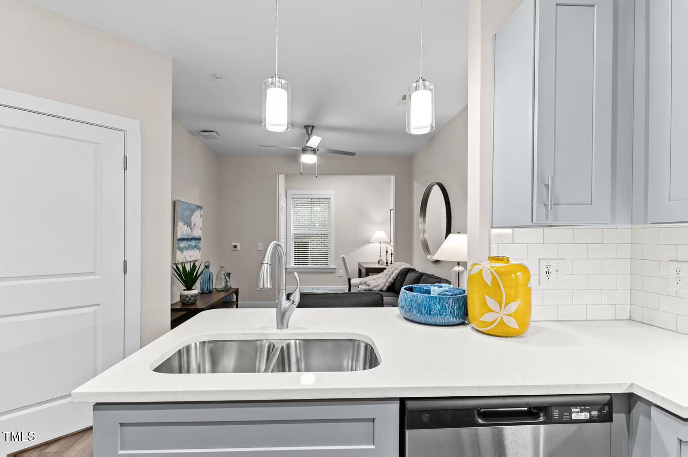 1001 Mulford Court, Unit B1 Knightdale, NC 27545 - Photo 25 of 41 a kitchen with a sink cabinets and appliances