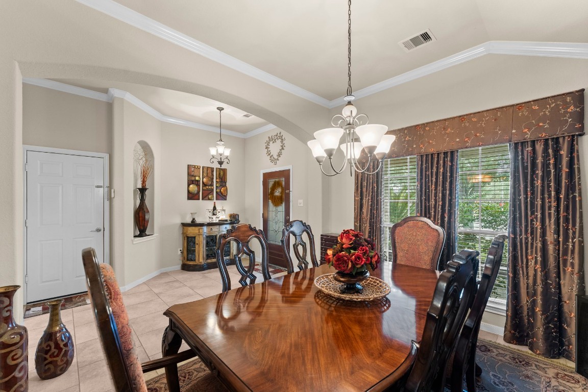 4618 Countrypines Drive Spring, TX 77388 - Photo 12 of 48 a view of a dining room with furniture window and wooden floor