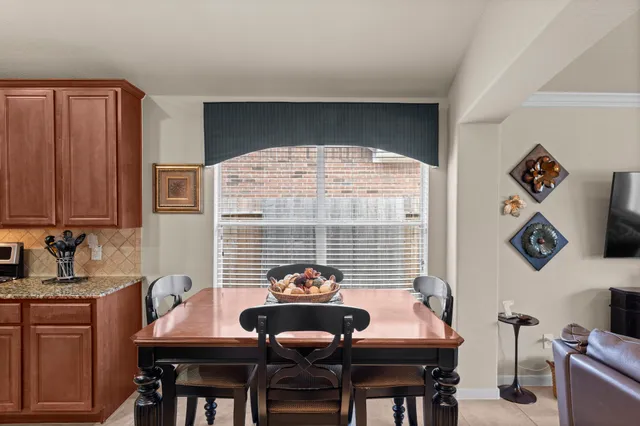 a view of a workspace with furniture