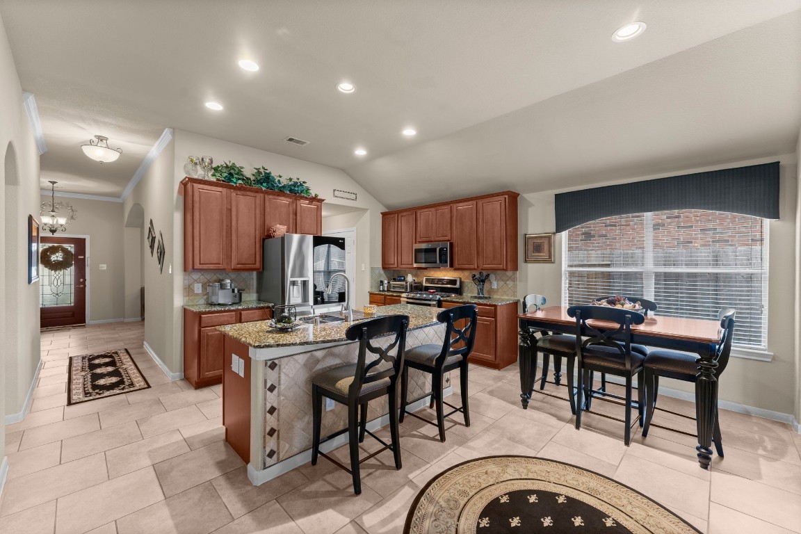 4618 Countrypines Drive Spring, TX 77388 - Photo 21 of 48 a view of a dining room with furniture