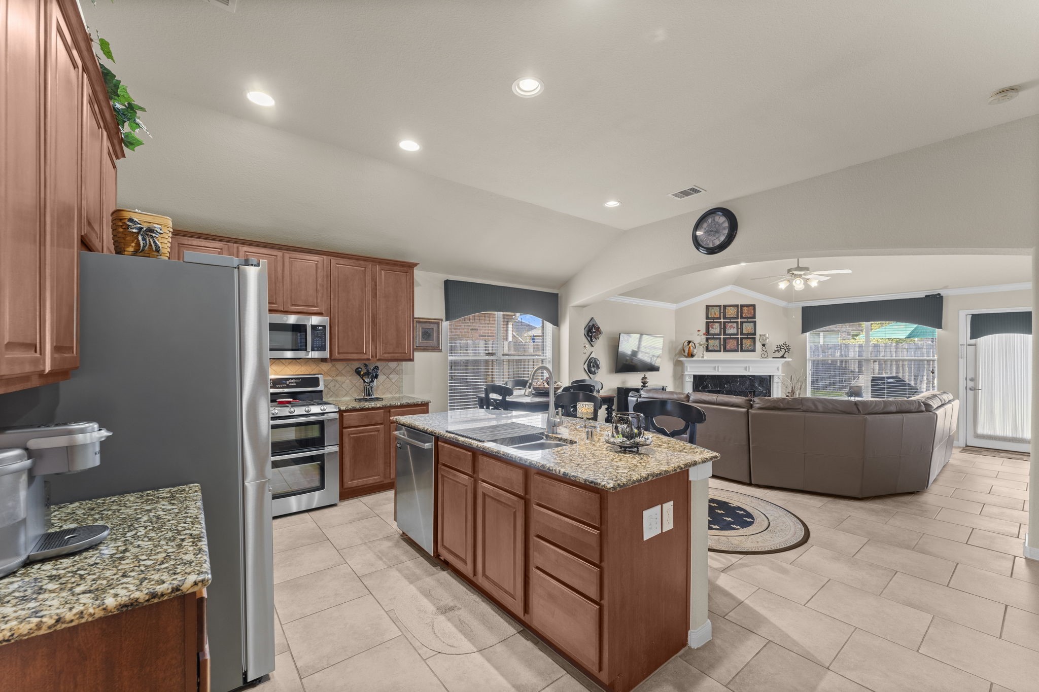 4618 Countrypines Drive Spring, TX 77388 - Photo 22 of 48 a kitchen with a stove a refrigerator and a stove