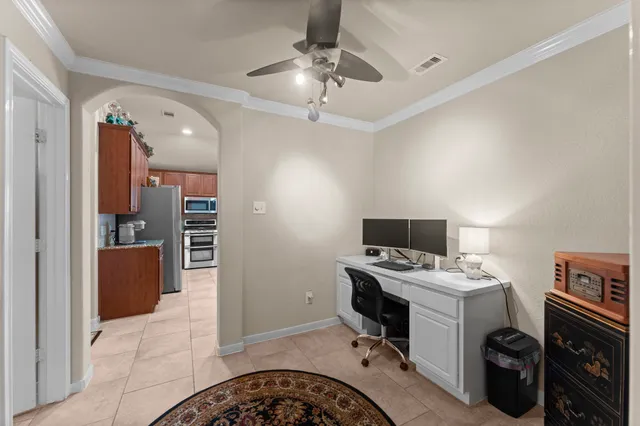 a view of a workspace with furniture