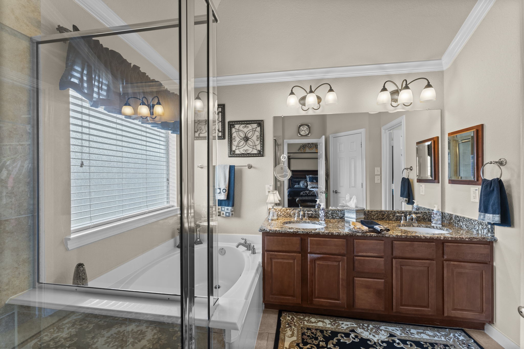 4618 Countrypines Drive Spring, TX 77388 - Photo 31 of 48 a bathroom with a sink and a mirror