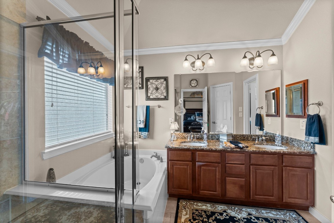 4618 Countrypines Drive Spring, TX 77388 - Photo 31 of 48 a bathroom with a sink and a mirror