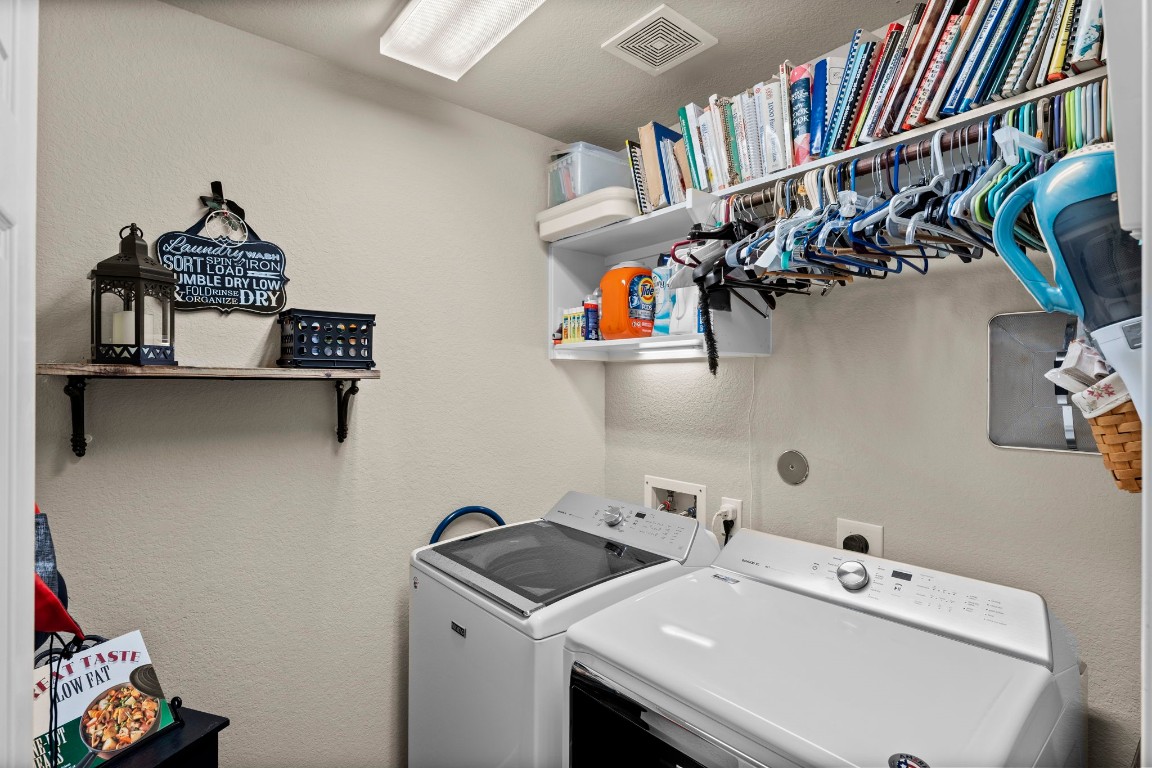 4618 Countrypines Drive Spring, TX 77388 - Photo 36 of 48 a utility room with dryer and washer