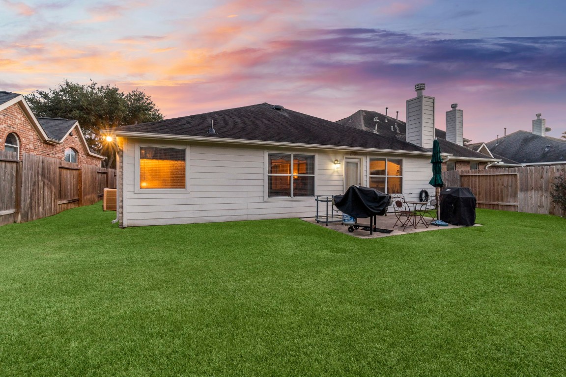 4618 Countrypines Drive Spring, TX 77388 - Photo 38 of 48 a view of a house with backyard sitting area and garden