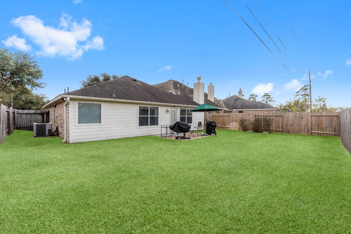 4618 Countrypines Drive Spring, TX 77388 - Photo 41 of 48 a view of a house with backyard and garden