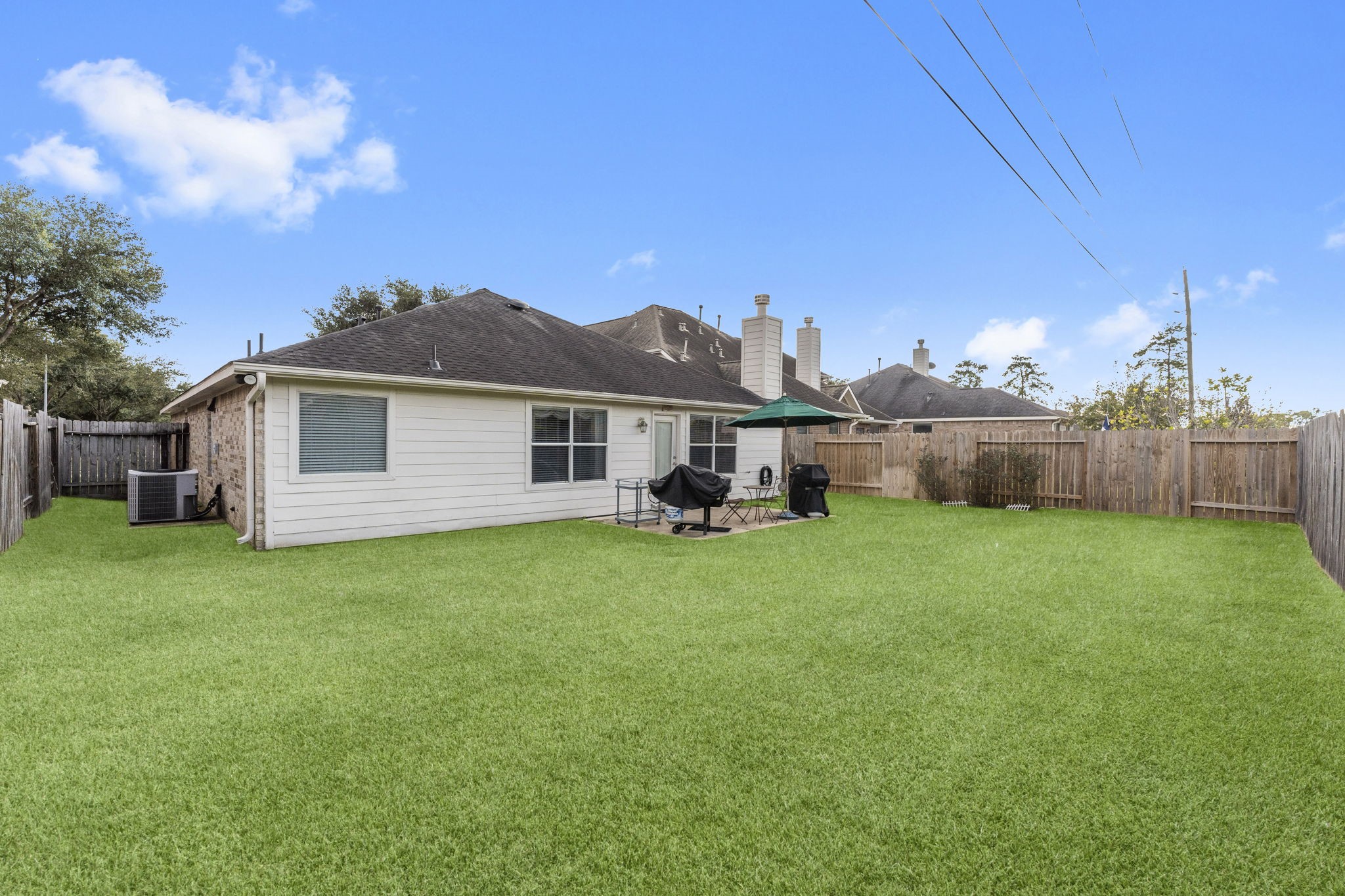 4618 Countrypines Drive Spring, TX 77388 - Photo 41 of 48 a view of a house with backyard and garden
