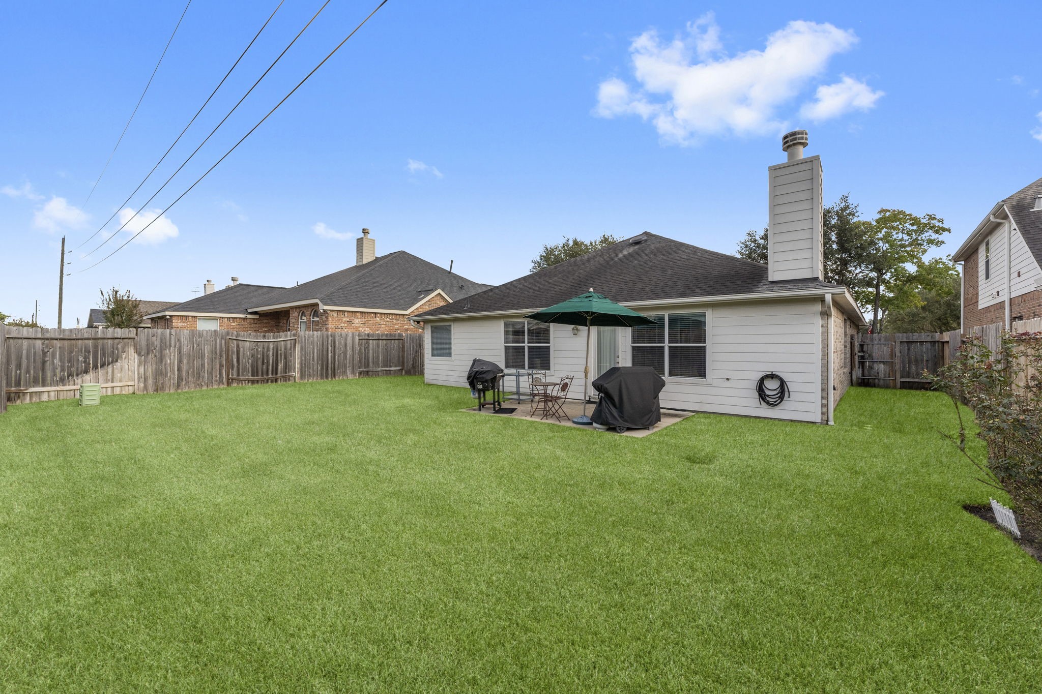 4618 Countrypines Drive Spring, TX 77388 - Photo 42 of 48 a front view of a house with garden