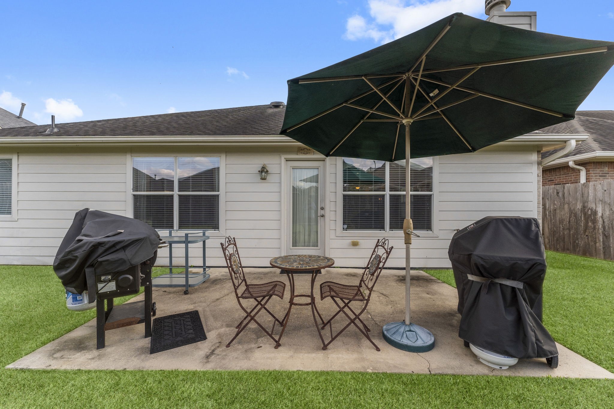 4618 Countrypines Drive Spring, TX 77388 - Photo 45 of 48 a patio with table and chairs