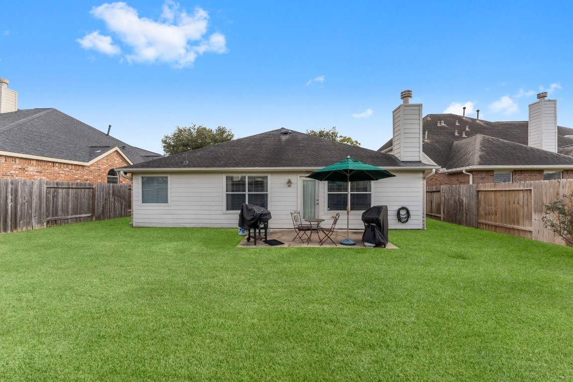 4618 Countrypines Drive Spring, TX 77388 - Photo 48 of 48 a view of a house with backyard and sitting area