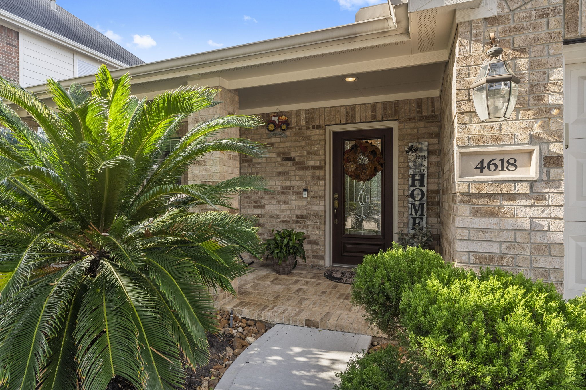 4618 Countrypines Drive Spring, TX 77388 - Photo 9 of 48 a front view of a house with a plant