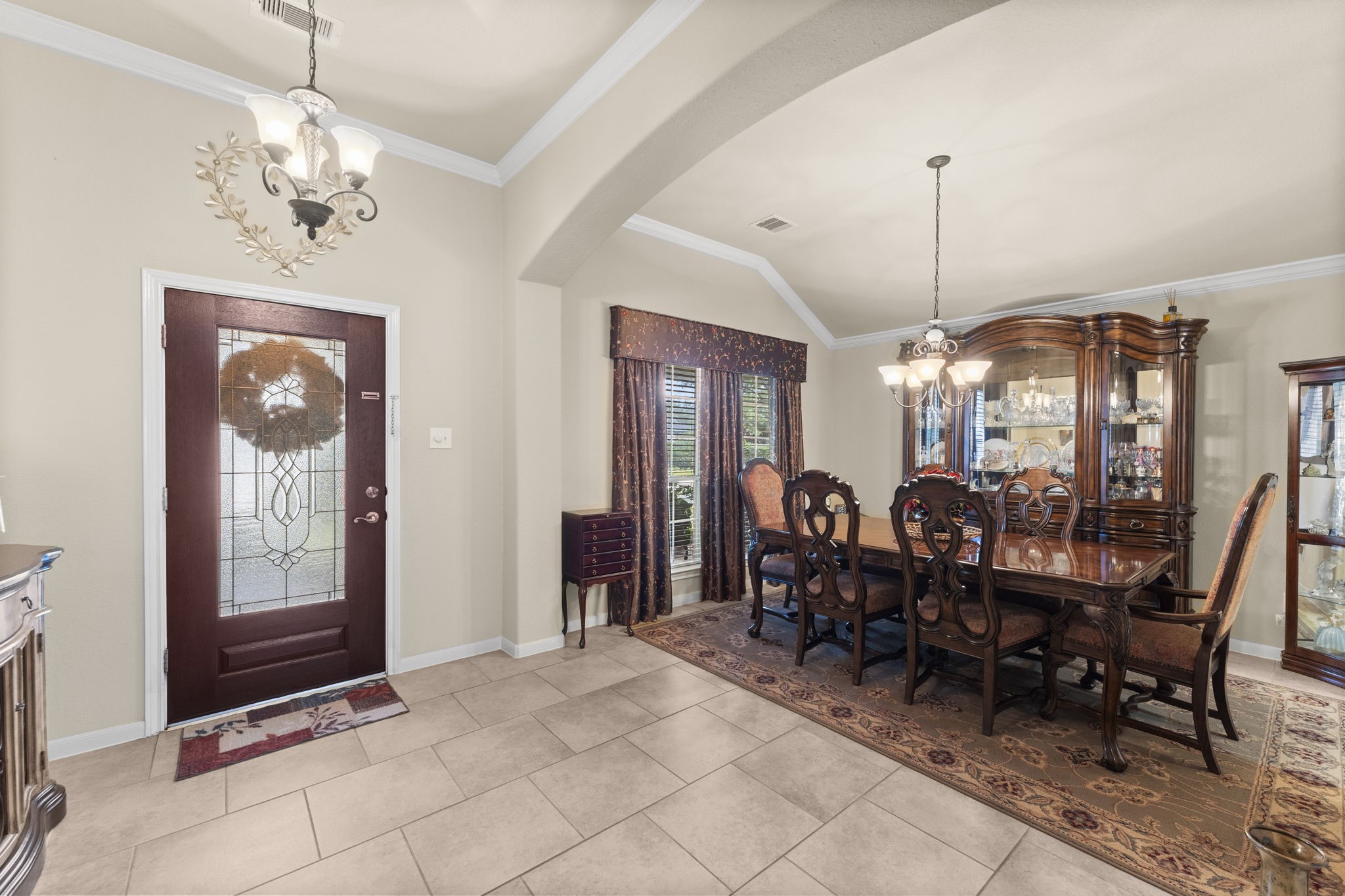 4618 Countrypines Drive Spring, TX 77388 - Photo 10 of 48 a view of a dining room with furniture and chandelier