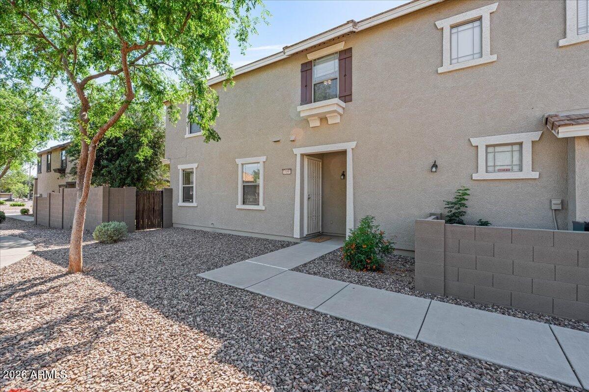 1255 South Rialto, Unit 106 Mesa, AZ 85209 - Photo 1 of 32 a house view with a backyard space
